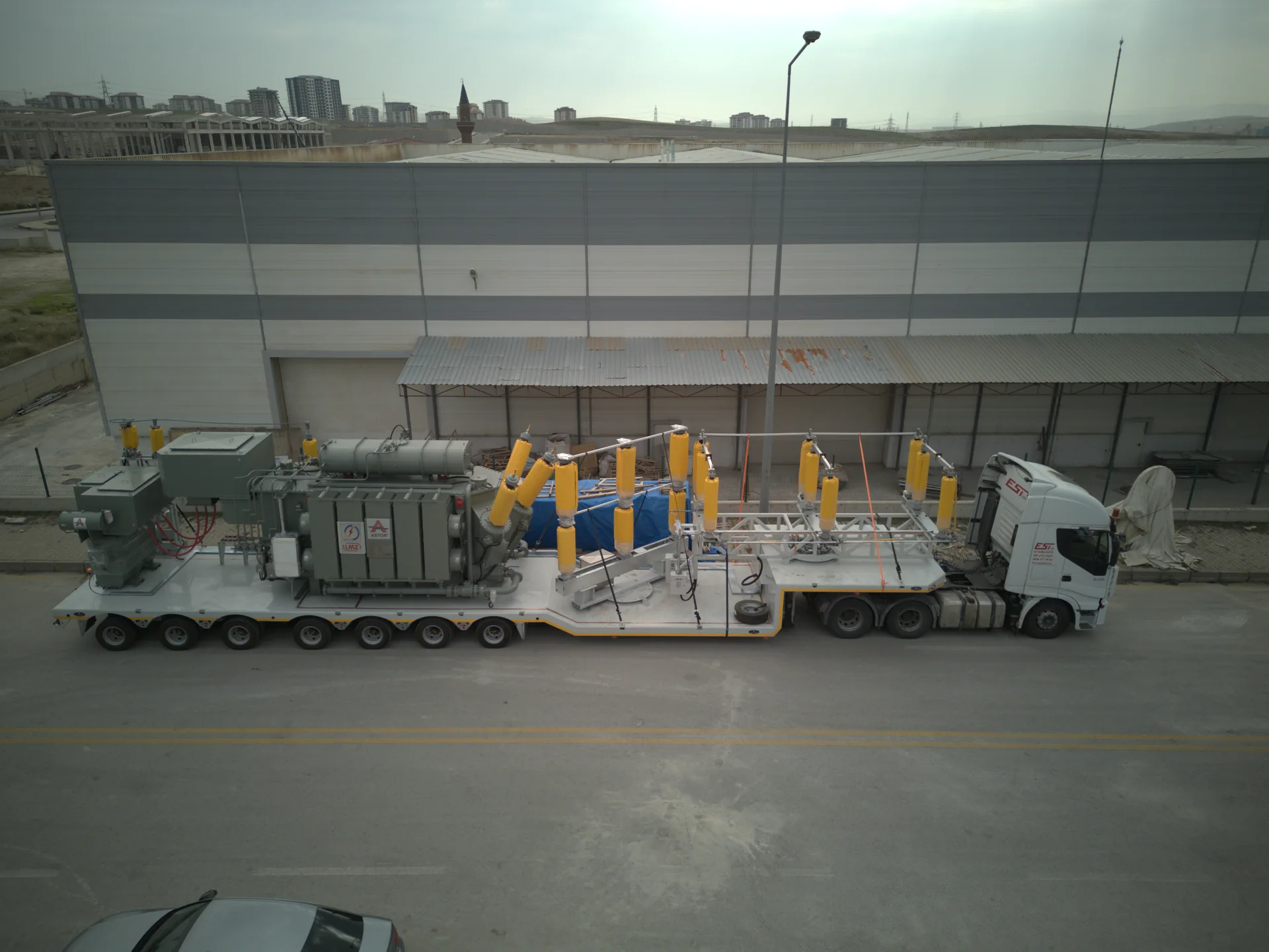 Aerial view of LMZ HV/MV mobile substation transport equipment and transformer