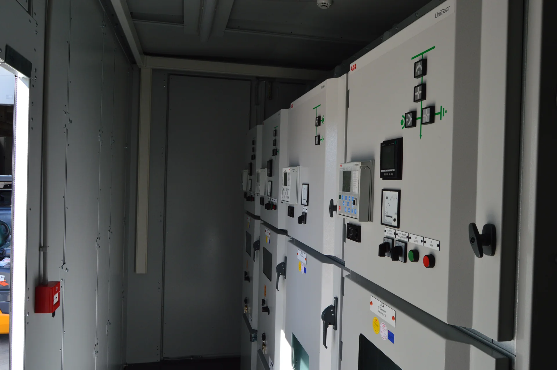 Rows of integrated electrical distribution panels inside LMZ Powerhouse E-House